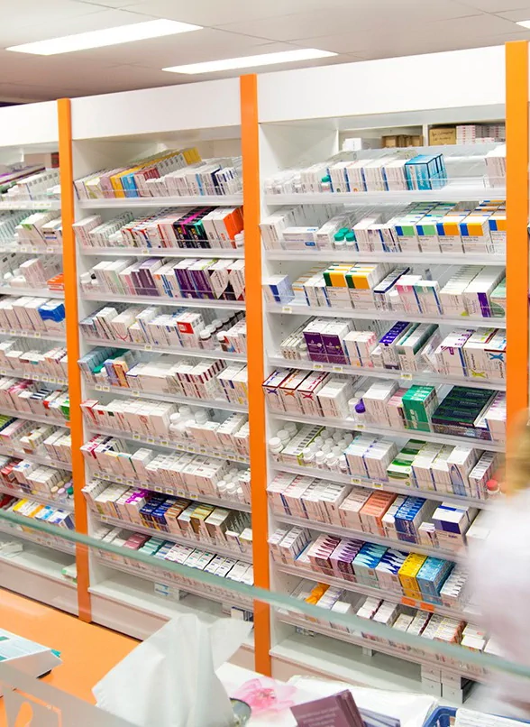 slanted shelves holding healthcare products in a store