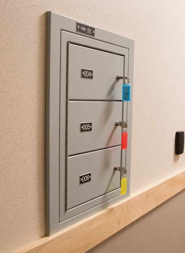 a close up image of a key entry locker in a wall