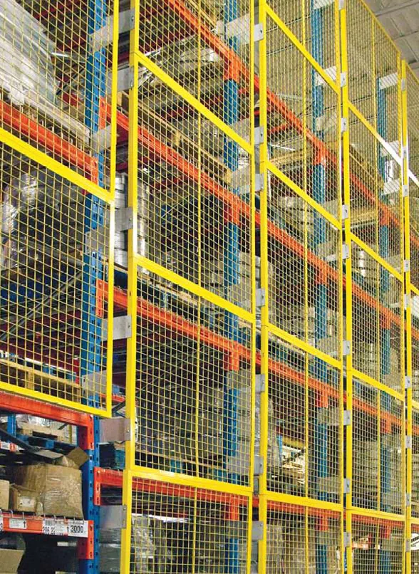 tall wire cages in a warehouse